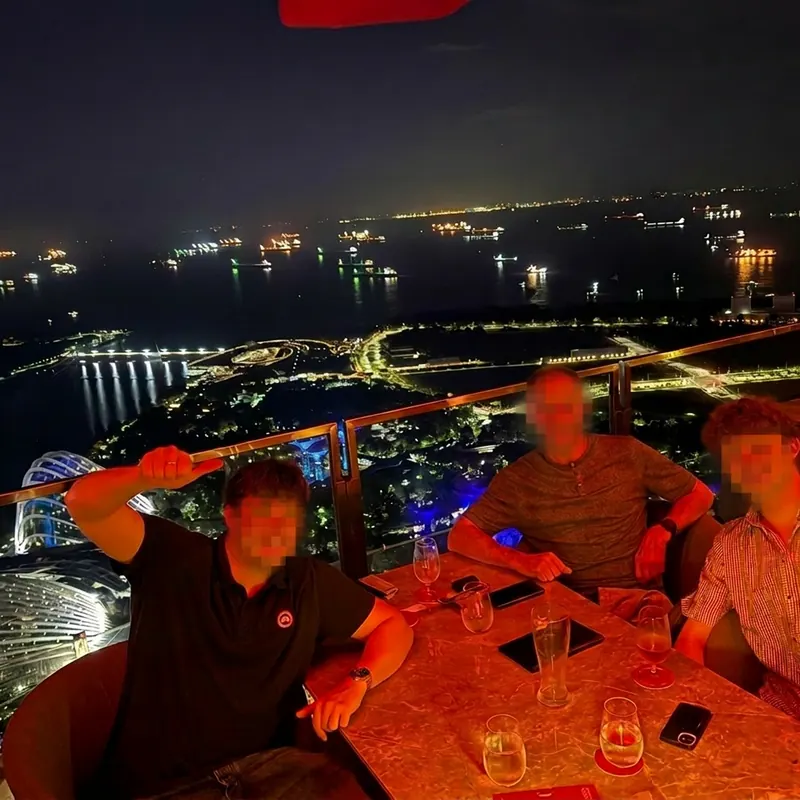 Rooftop bar overlooking Singapore harbour at night
